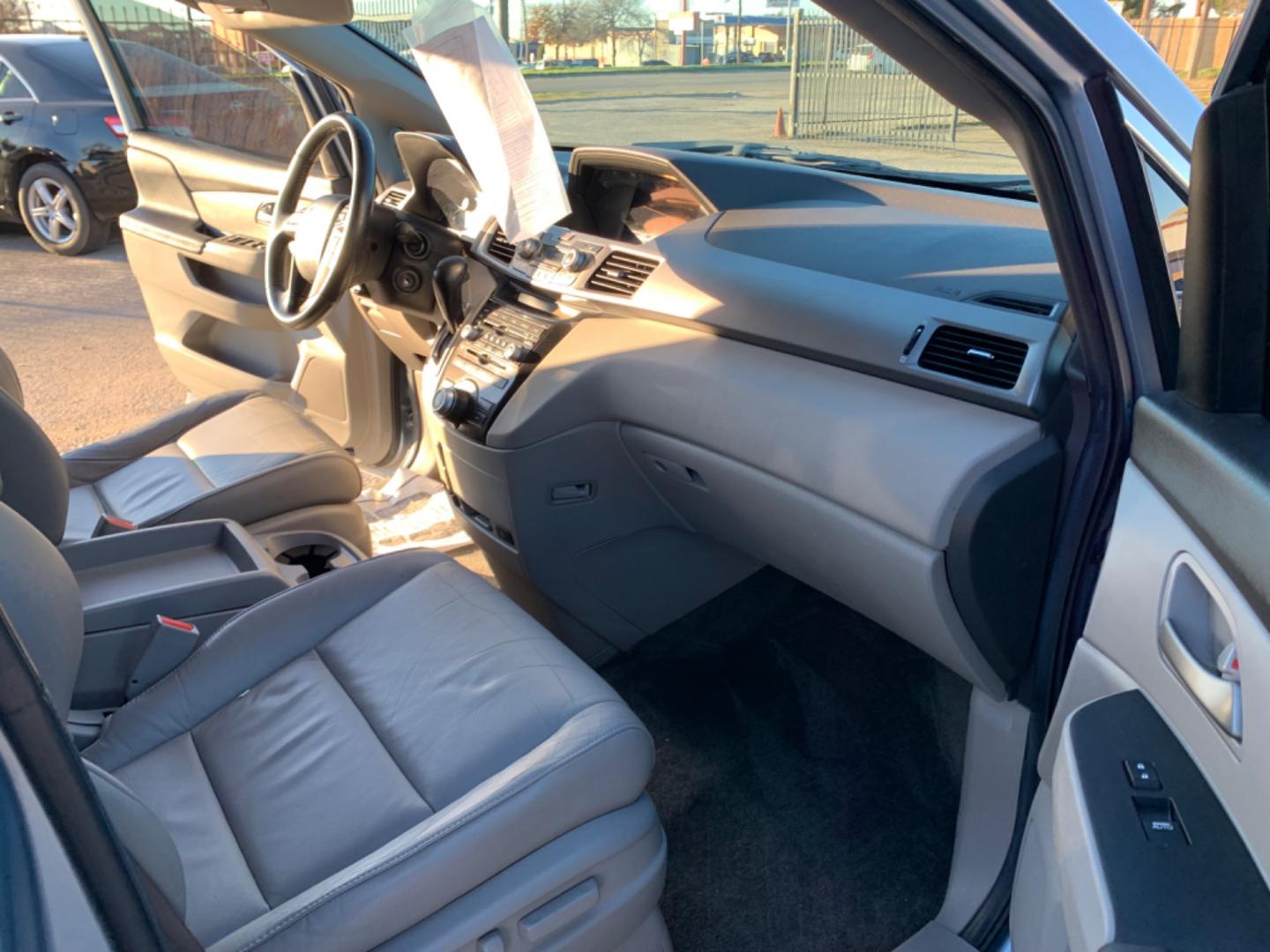 2012 Blue /gray Honda Odyssey Touring (5FNRL5H94CB) with an 3.7L L5 DOHC 20V engine, AUTOMATIC transmission, located at 1830 North Belt Line Road, Irving, TX, 75061, (469) 524-0199, 32.834373, -96.993584 - Photo#13